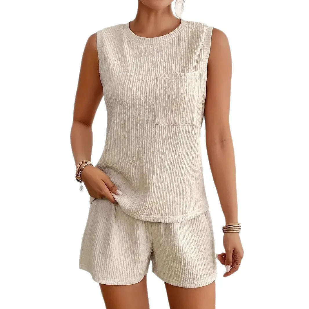 Women's apricot sleeveless round neck vest and matching shorts leisurewear set laid flat