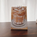 Mini 2025 desk calendar showing four design options including coffee time and motivational phrases