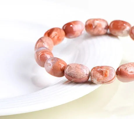 Natural cherry agate barrel bead bracelet with Ruyi pattern geometric design