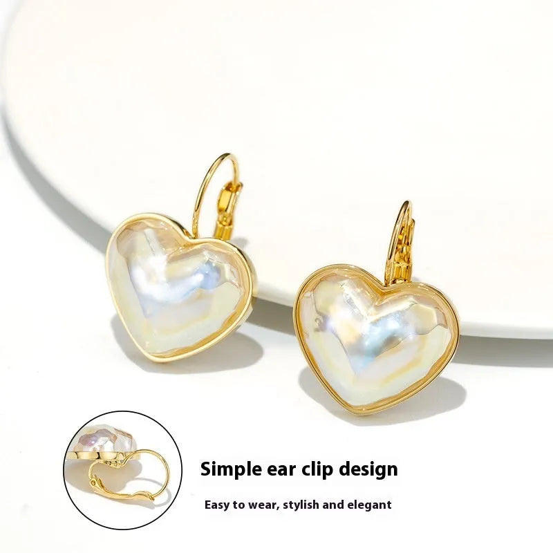 Gold women's ear clip with summer love design and clip-on fastening