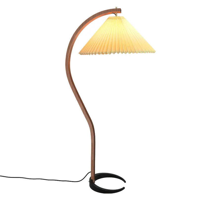 Vertical retro floor lamp with wood shade in three-colour variable light beside bed
