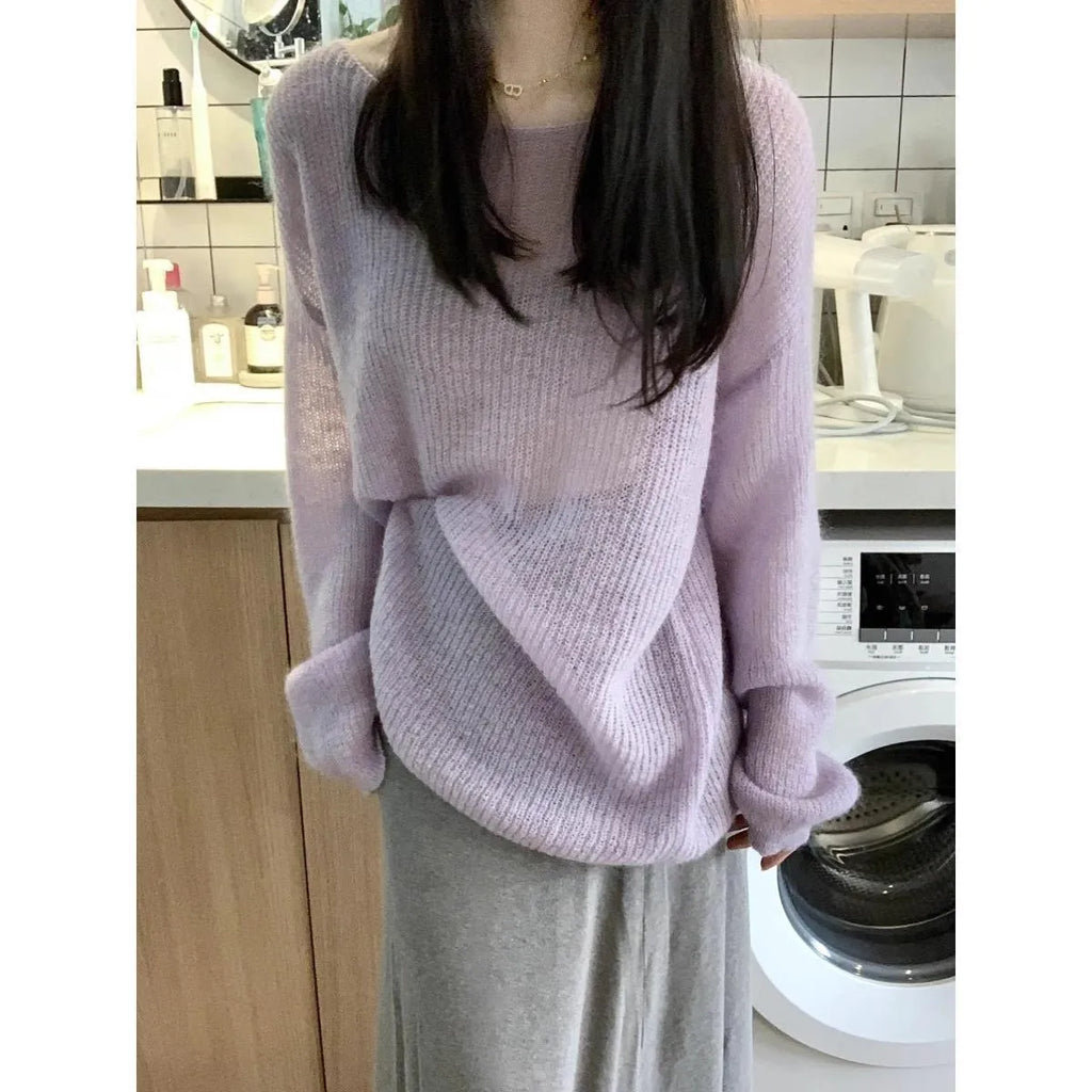 Purple women's blouse with hollow out pattern and princess sleeves on mannequin