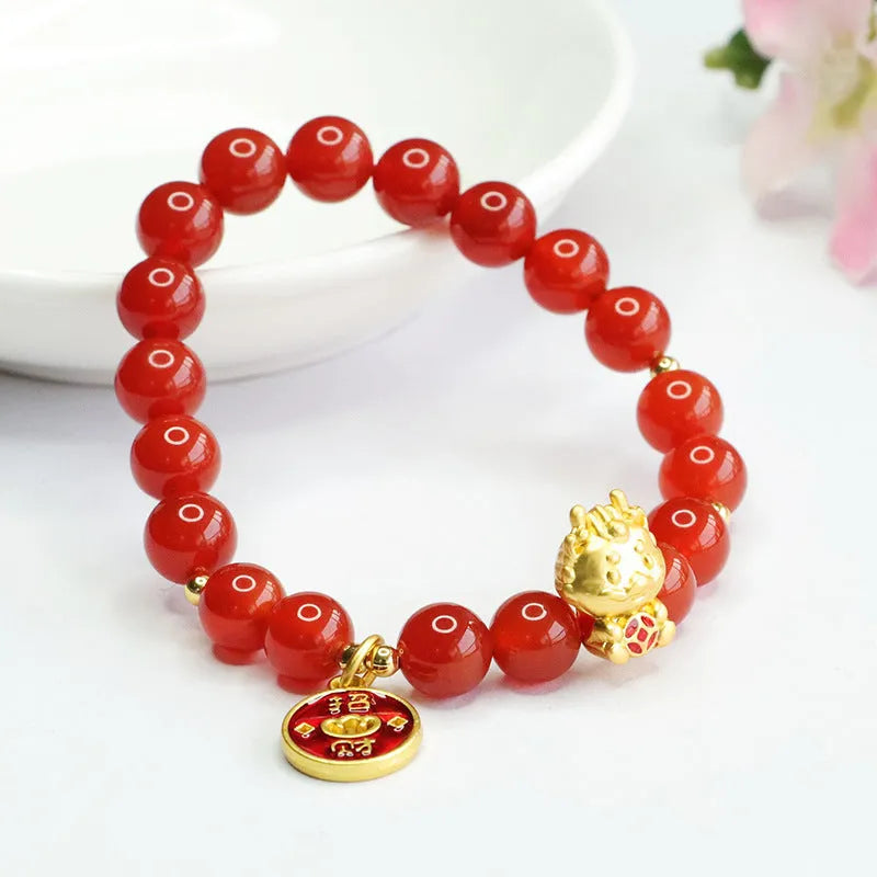 8mm red agate bead bracelet with Dragon charm on black elastic cord.