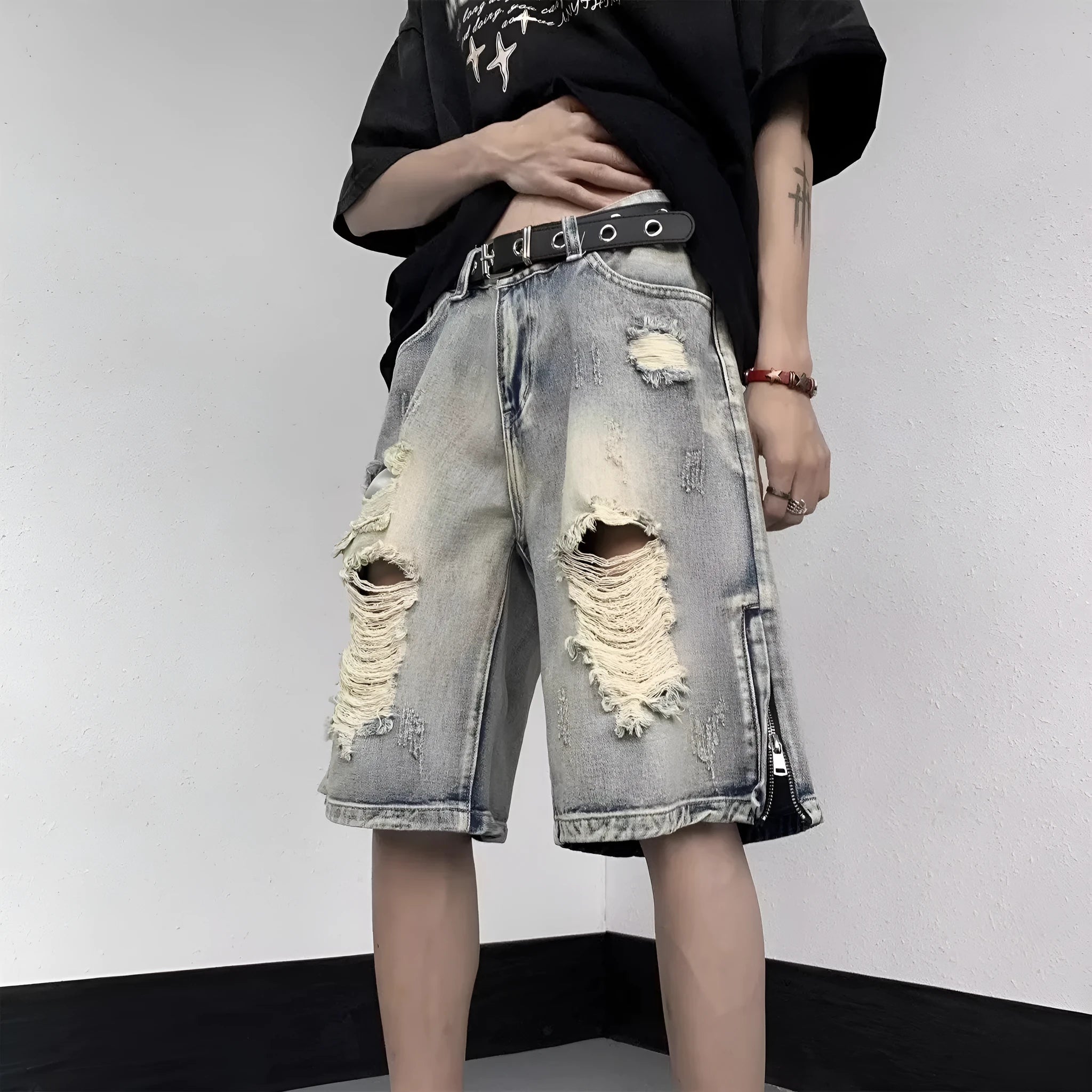 Blue retro-style denim shorts with a loose wide-leg fit on a mannequin.