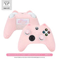 Cat ear silicone game controller cover in Pink with joystick caps and sticker on a white background