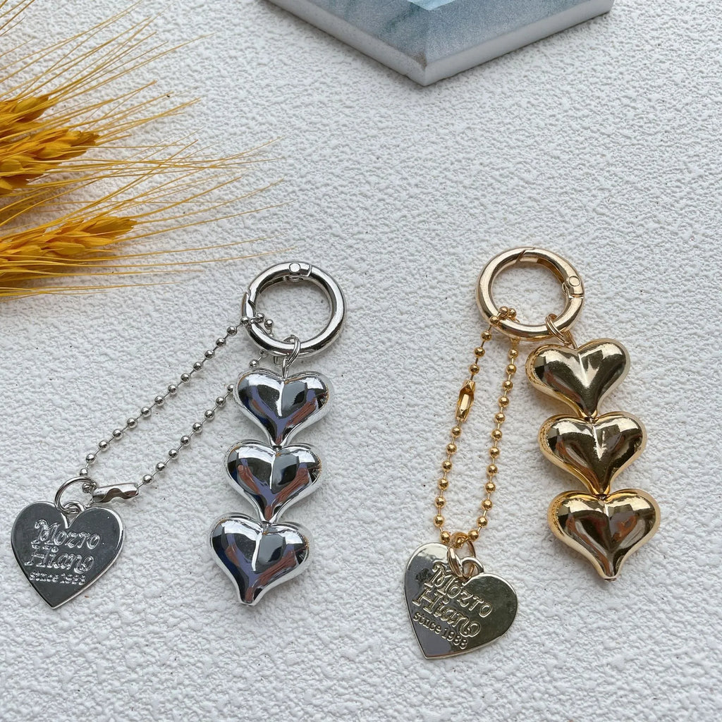 Fart Peach Love electroplated acrylic key ring with heart pattern in black, gold or white