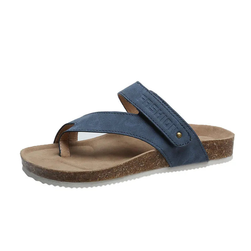 Flat toe ring flip-flops with a thick foam sole in a solid colour, shown in blue.