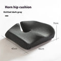Black memory foam office chair cushion with a solid colour polyester cover, shown on a chair seat.