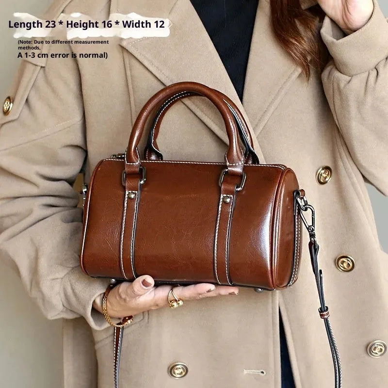 Cortex Lady casual zip crossbody bag in top grain leather, cylindrical shape, patchwork, available in caramel colour