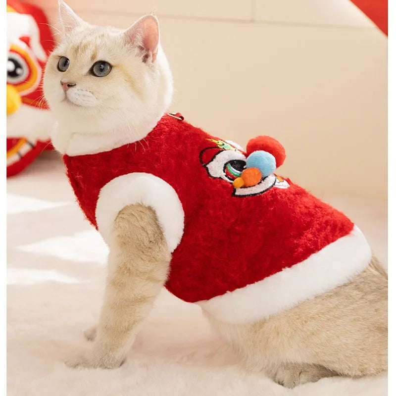 Red pet lion dance sweater with 3D face, colourful pom-poms, and leash ring on small dog