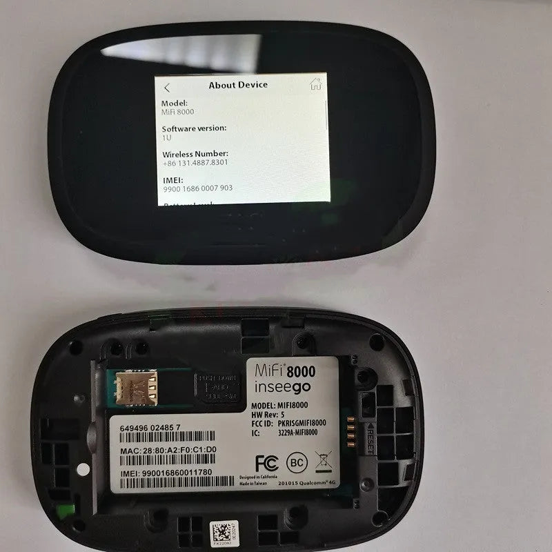 Black MiFi8000 4G portable wireless router with battery and data cable.