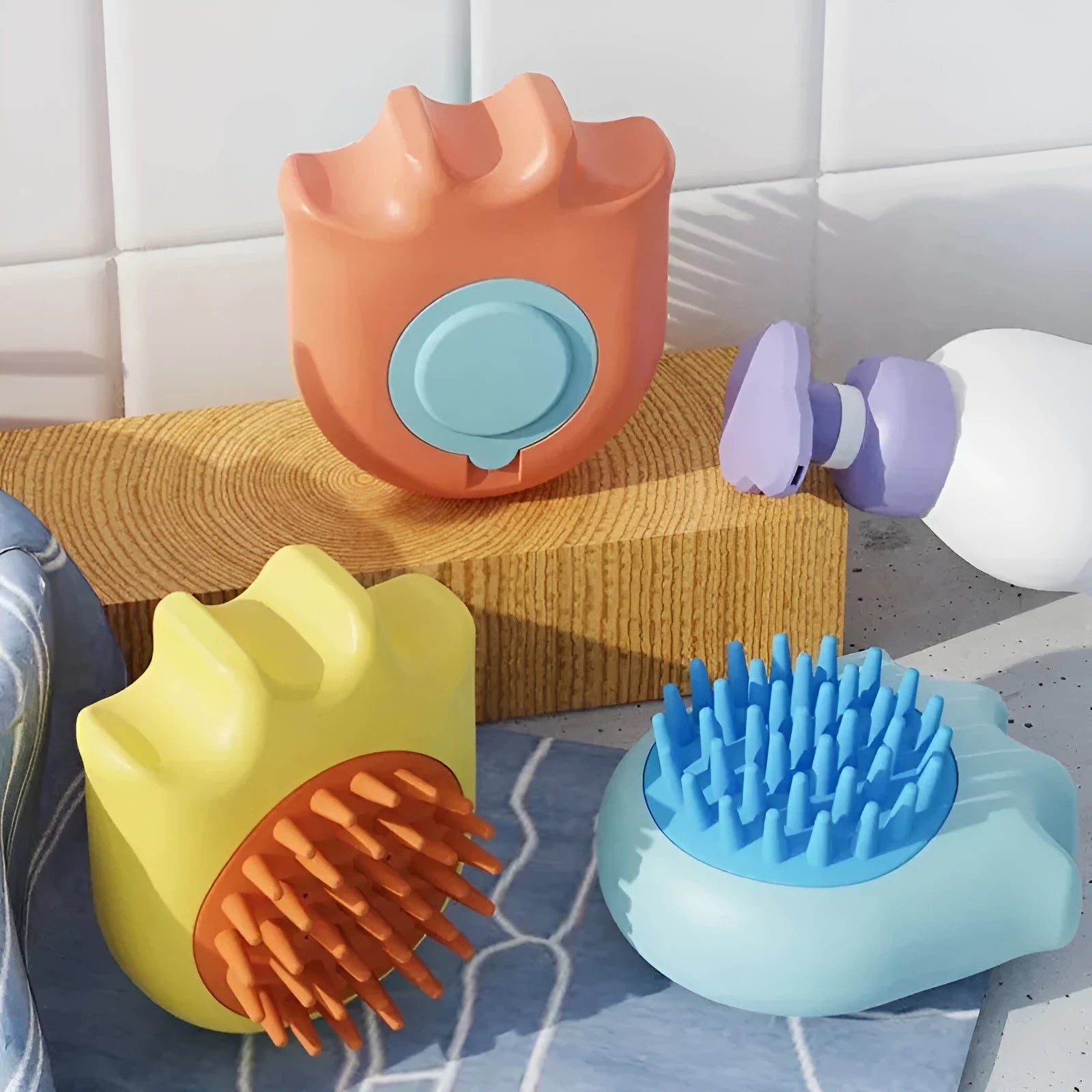 Pet bath brush with shampoo compartment and four brush attachments in blue orange yellow options