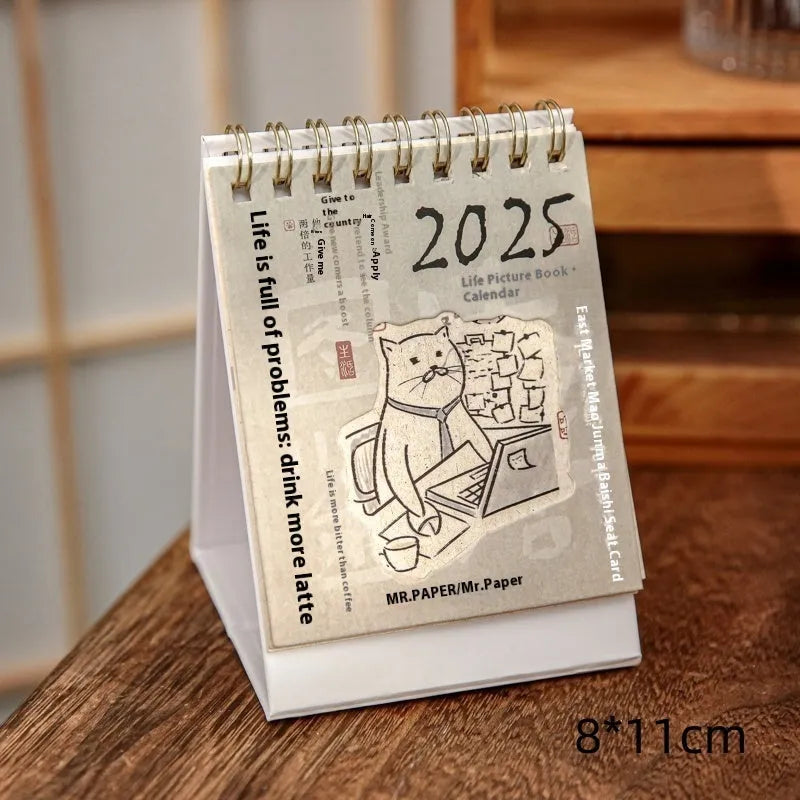 Mini 2025 desk calendar showing four design options including coffee time and motivational phrases