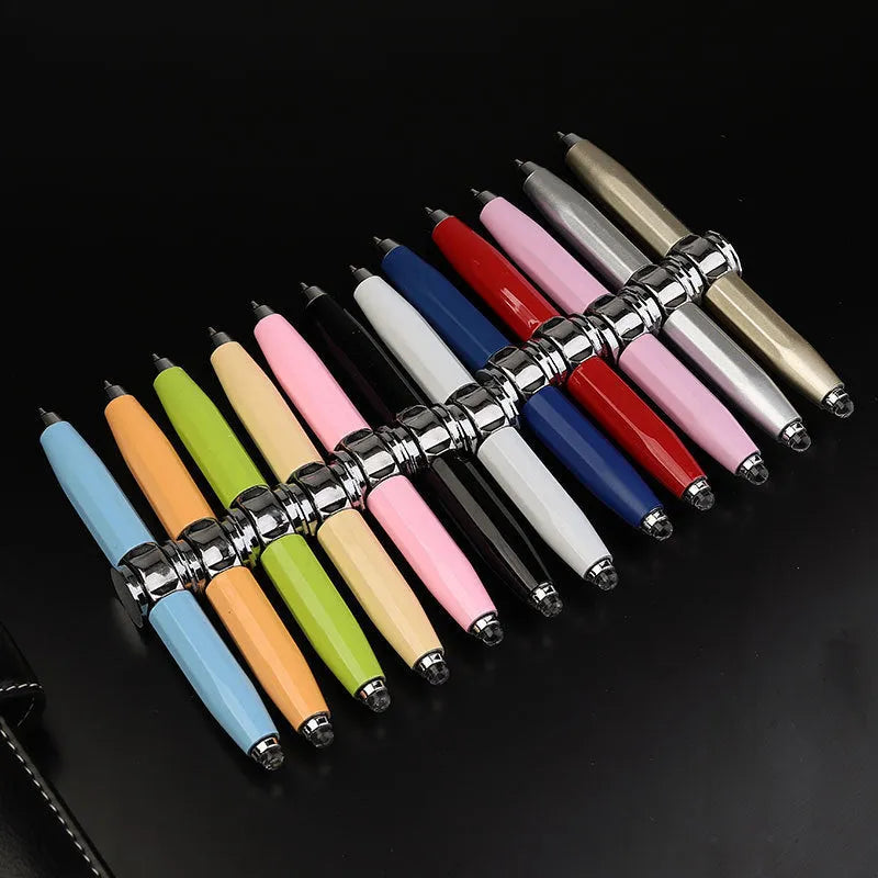 Metal gyro ballpoint pen with LED spinner, shown in multiple refill colour options.