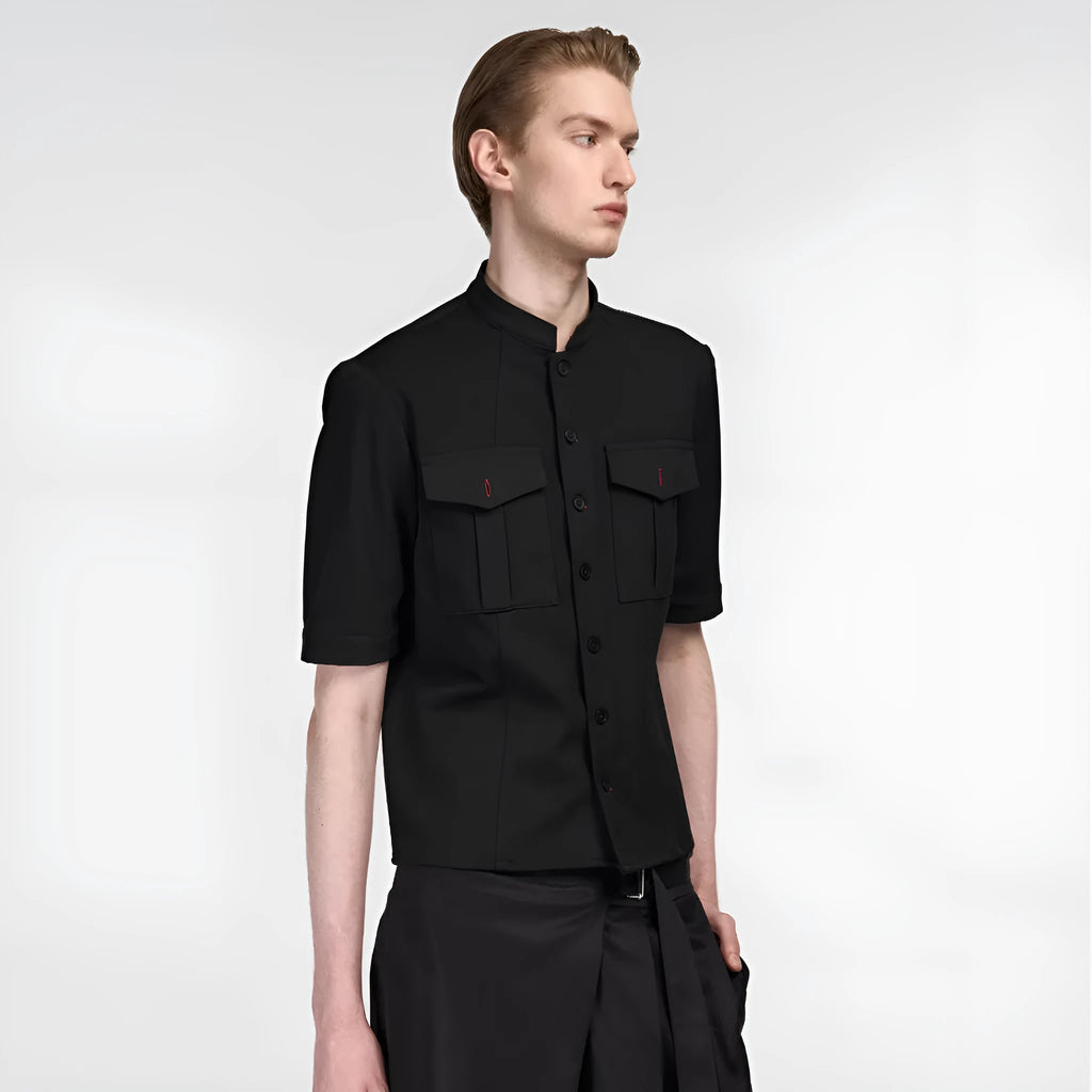 Black handmade loose fit half sleeve hunting shirt with a traditional shirt collar on a hanger.