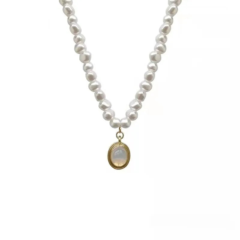 Vintage pearl necklace with geometric pendant on adjustable chain