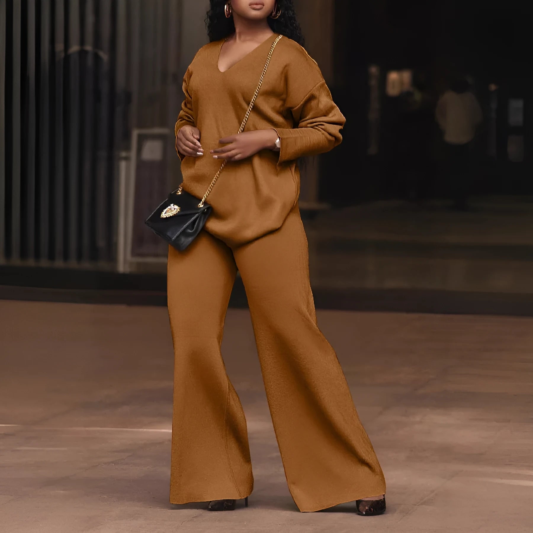 Women's brown thickened suede two-piece suit with long sleeves, shown as a complete co-ordinated set.