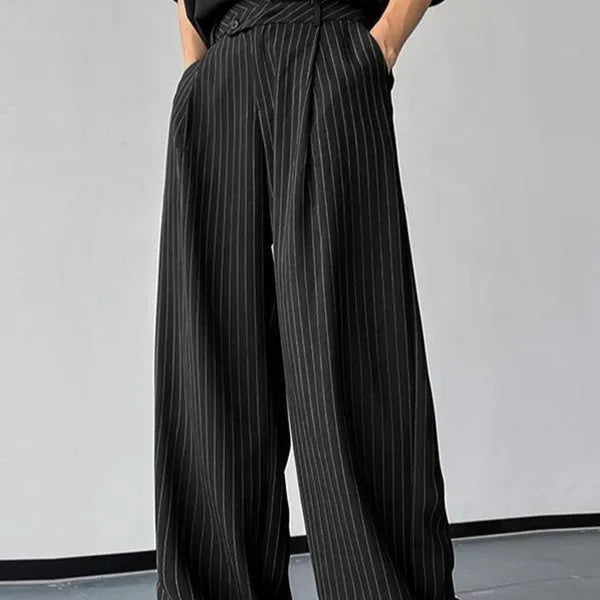 Black men's trousers with vertical stripes, front pleats, and a soft rabbit hair bamboo fibre fabric blend.