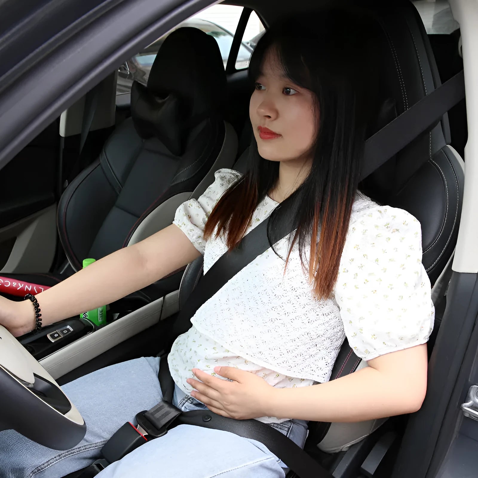 Pregnancy seat belt support in black, beige, and red colour options with wrap-around design