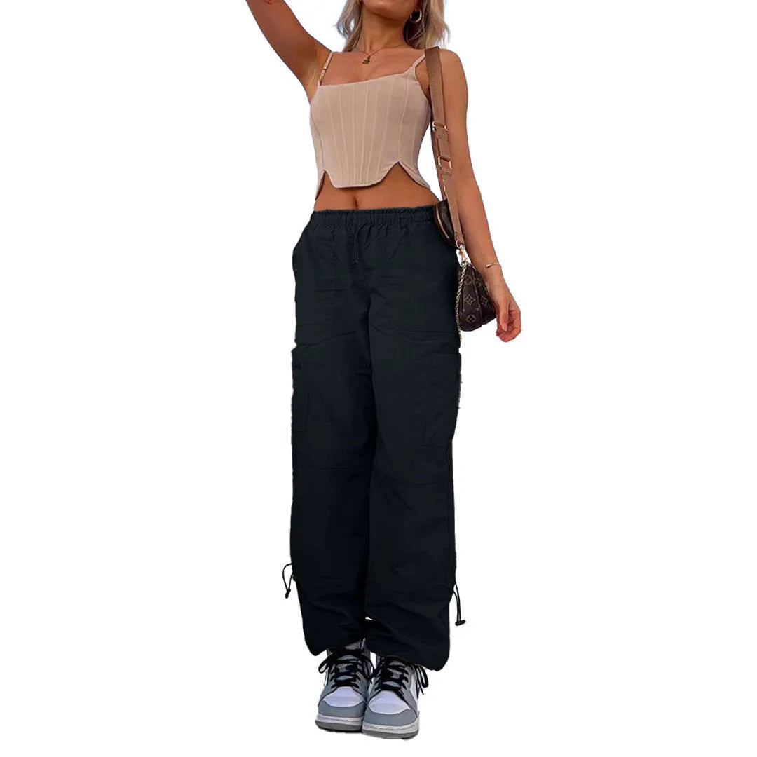 Multi-pocket cargo casual pants in a loose fit, shown in a neutral colour like grey or khaki.