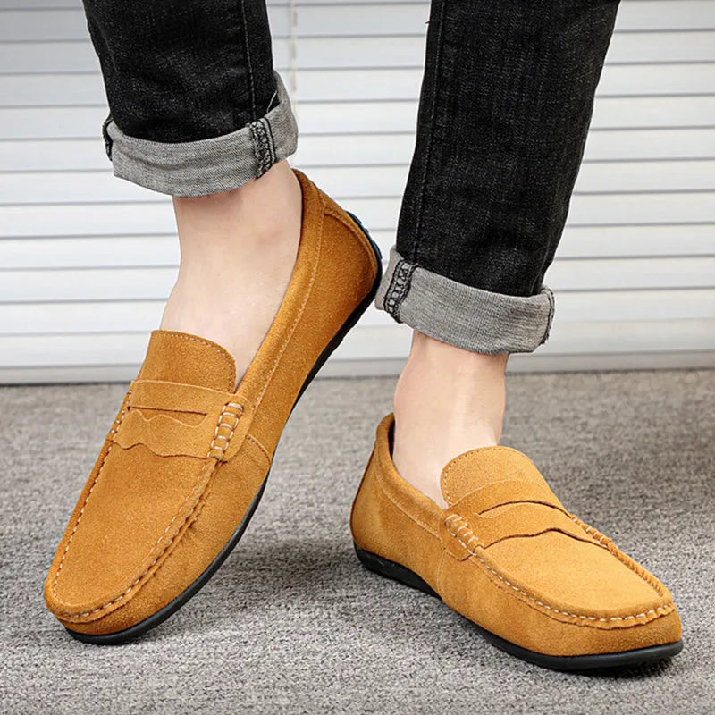Men's solid colour suede loafers slip-on shoes with round toe and flat rubber sole.