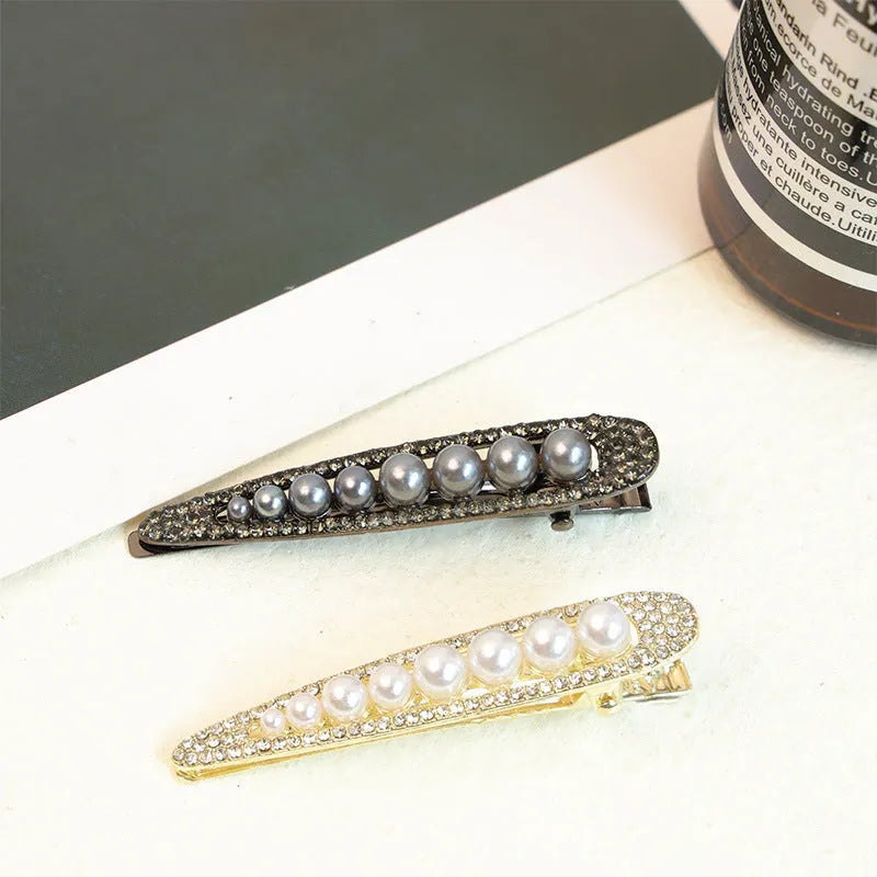 Alloy pearl front duck barrette for women with electroplated finish in black vintage pearl style