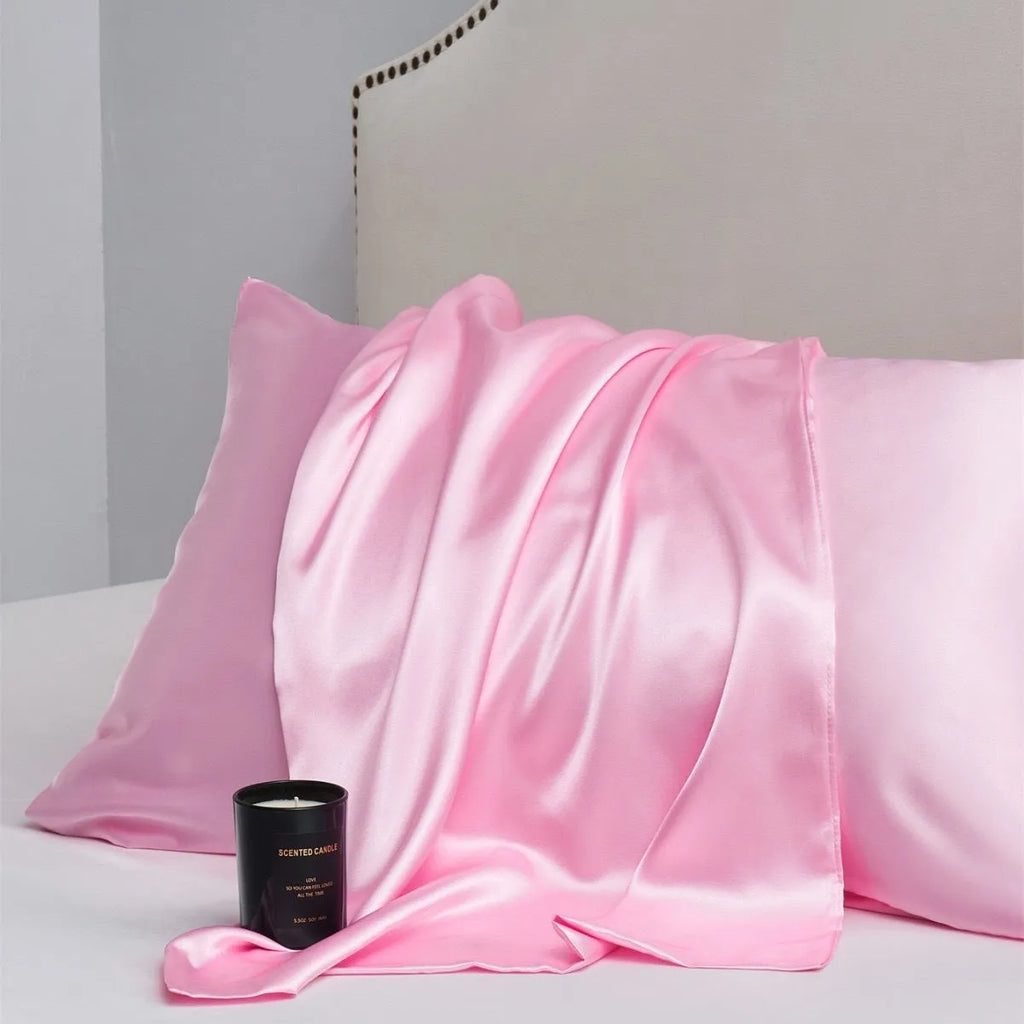 A pair of solid colour satin pillowcases in a chosen shade, shown flat to display size and plain weave texture.
