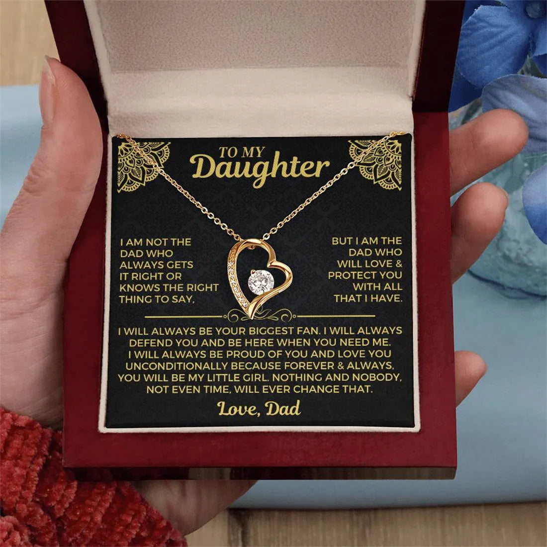 Hollow heart-shaped pendant necklace in gold or silver finish with gift box and card.