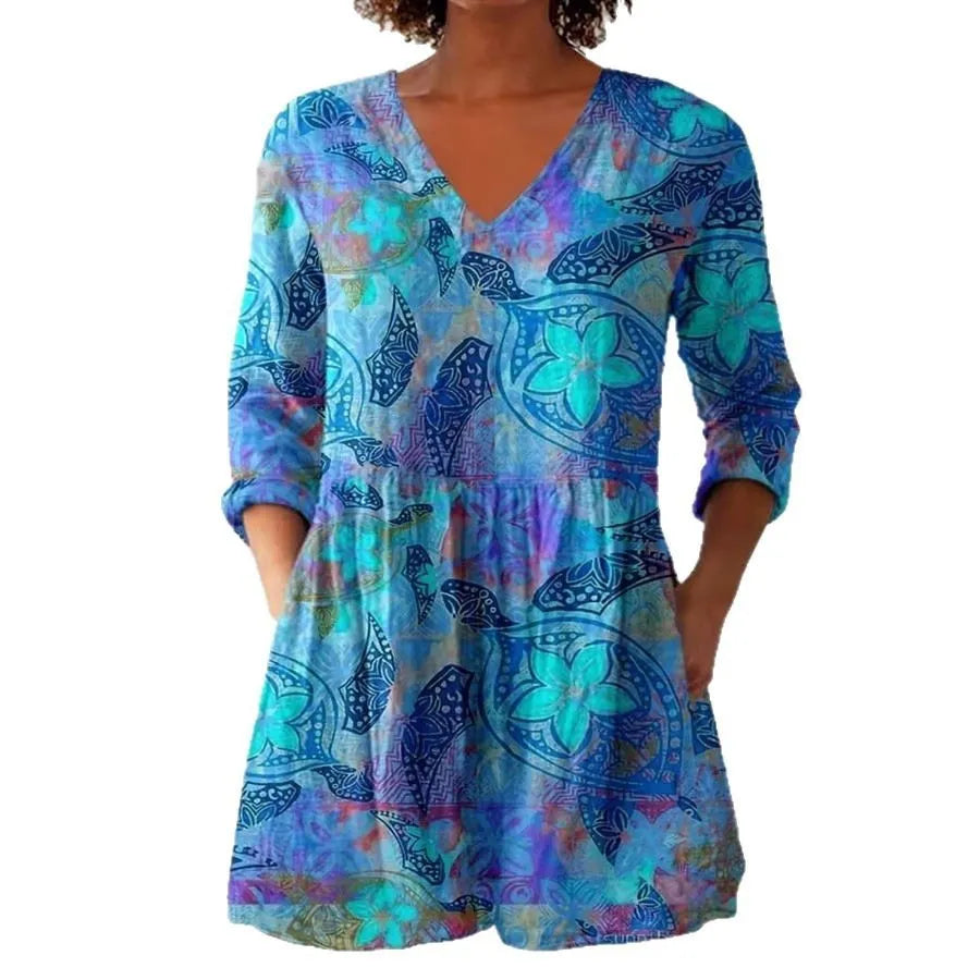 Women's retro-style slim fit long-sleeved top with a digital print pattern, shown on a hanger.