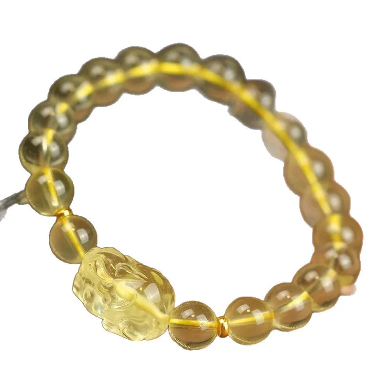 Yellow leather bracelet with artificial citrine crystal Pi Xiu charm.