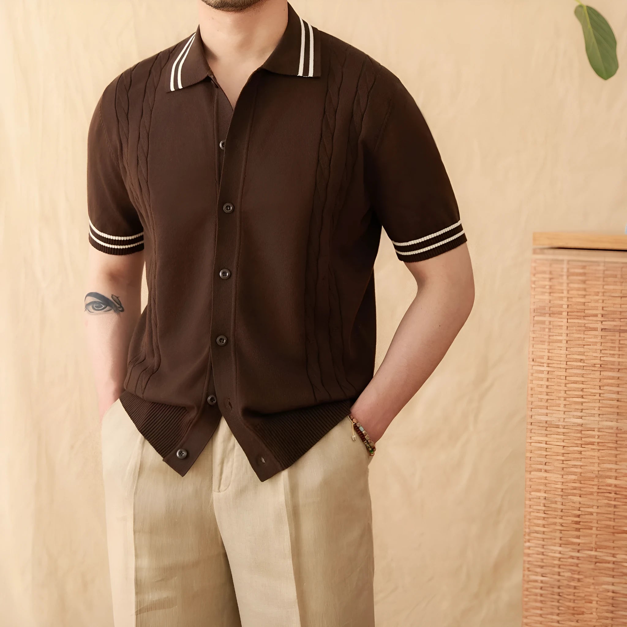 Short sleeve lapel collar polo shirt in a cotton blend fabric shown in apricot colour.