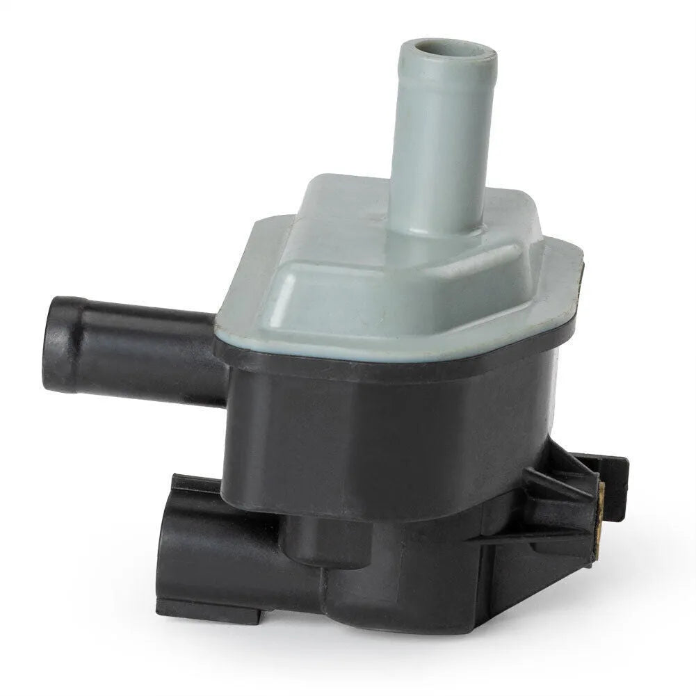 Toyota vacuum solenoid valve part number 90910-12283, a black electromagnetic component.