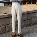 Men's slim fit straight-leg suit trousers in black, white, and apricot colours.