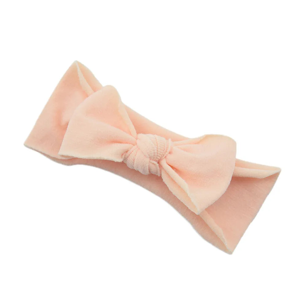Solid colour knotted cloth headband for baby girls with bowknot design, available in 37 colours