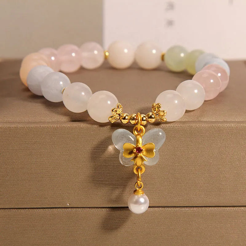 Colourful morganite bracelet with crystal butterfly pendant on silver chain
