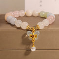 Colourful morganite bracelet with crystal butterfly pendant on silver chain