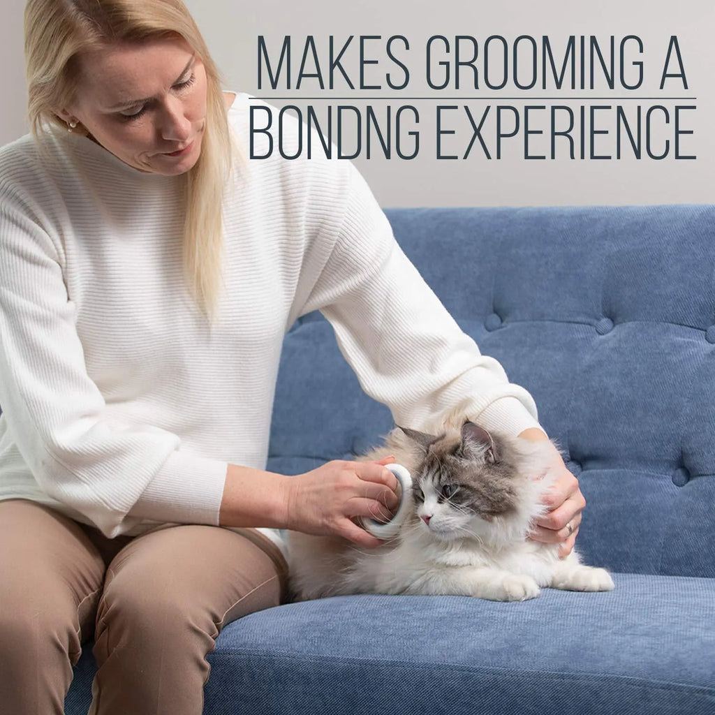 Blue plastic pet grooming comb for deshedding and dematting cat and dog hair on a white background.