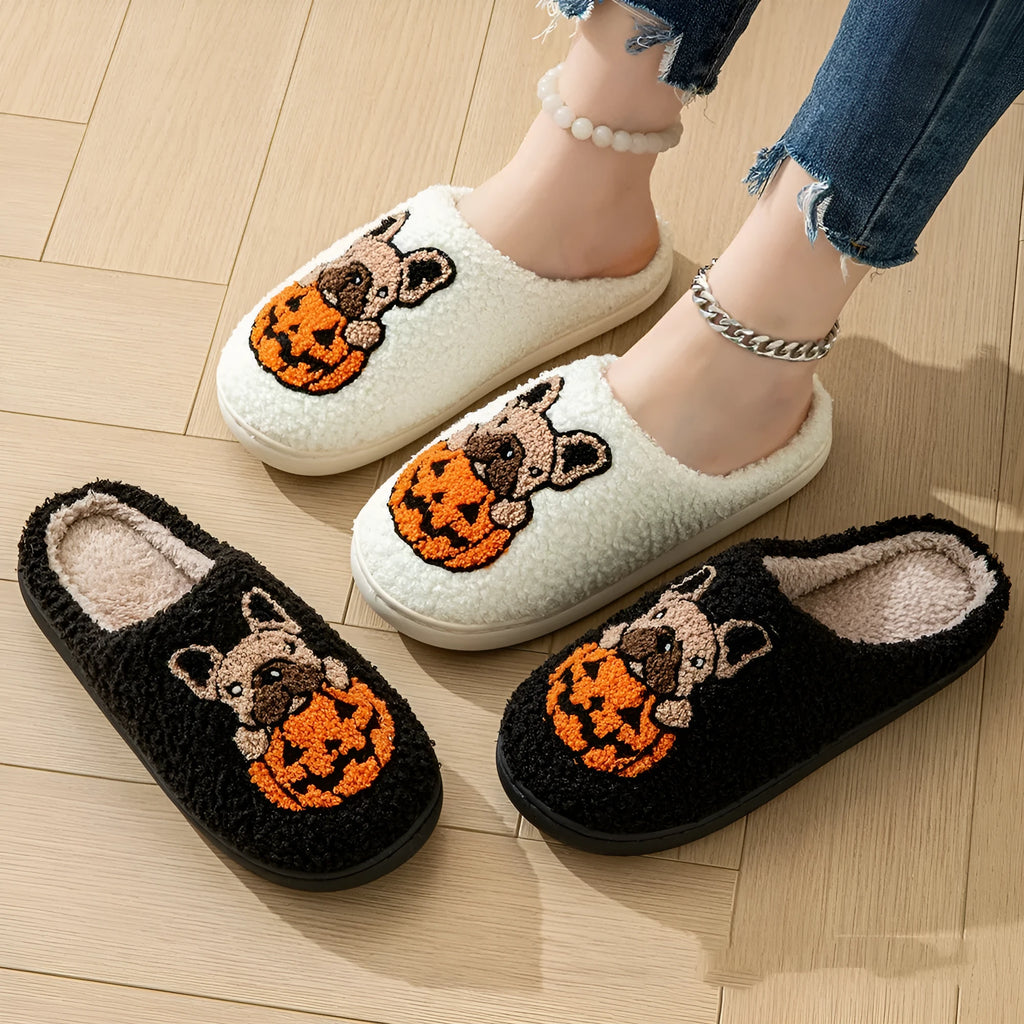 Halloween pumpkin design plush slippers with TPR rubber soles in white or black.
