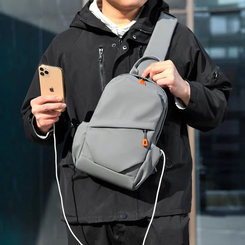 Men's black casual crossbody bag made from waterproof polyester material