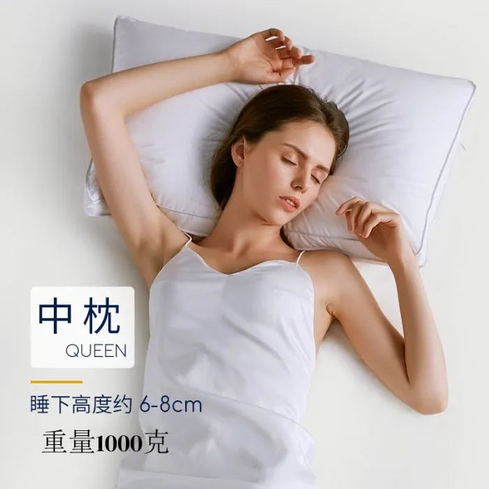 White cotton satin stripe feather pillow showing natural filling and simple styling