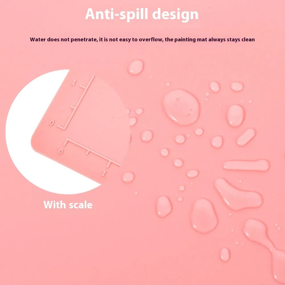 Light blue silicone painting mat with two built-in mixing bowls for graffiti and watercolour art.