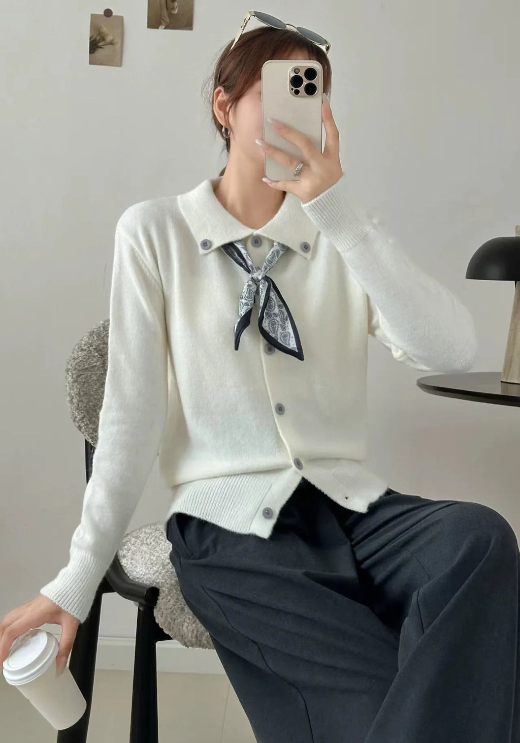 Women's milky white cardigan sweater with a built-in lapel scarf collar and long sleeves.