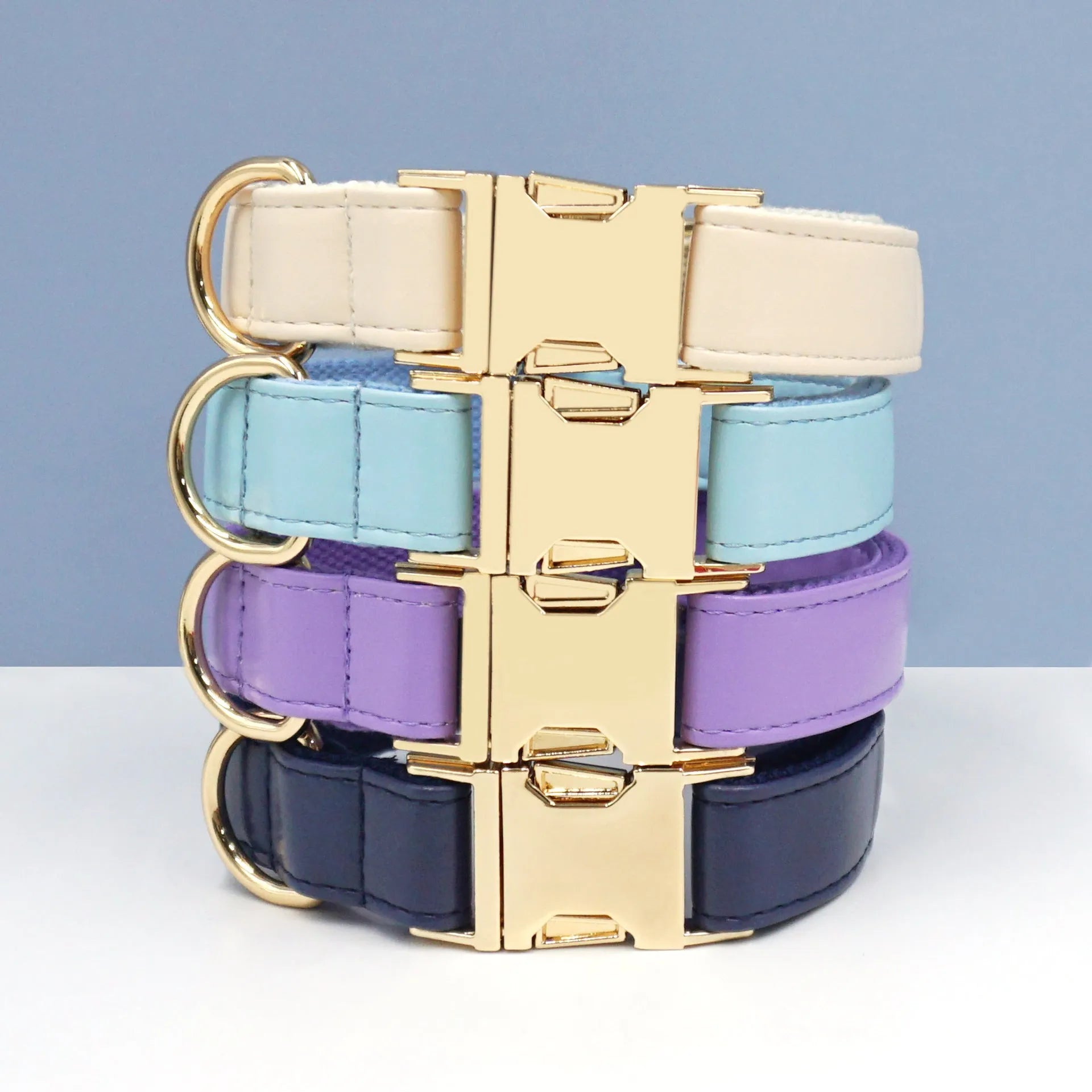 Leather Velvet-style dog collar shown in multiple colour options including caramel, dark blue, and dark brown.