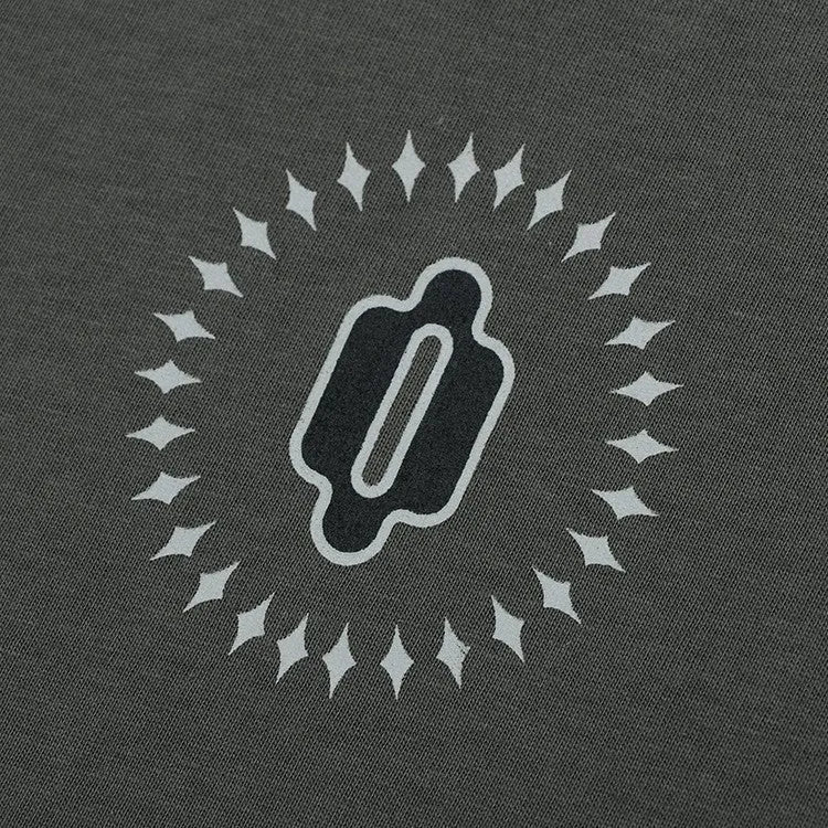Man wearing a gray khaki loose fit cotton sweatshirt with a letter pattern and drop shoulder sleeves.