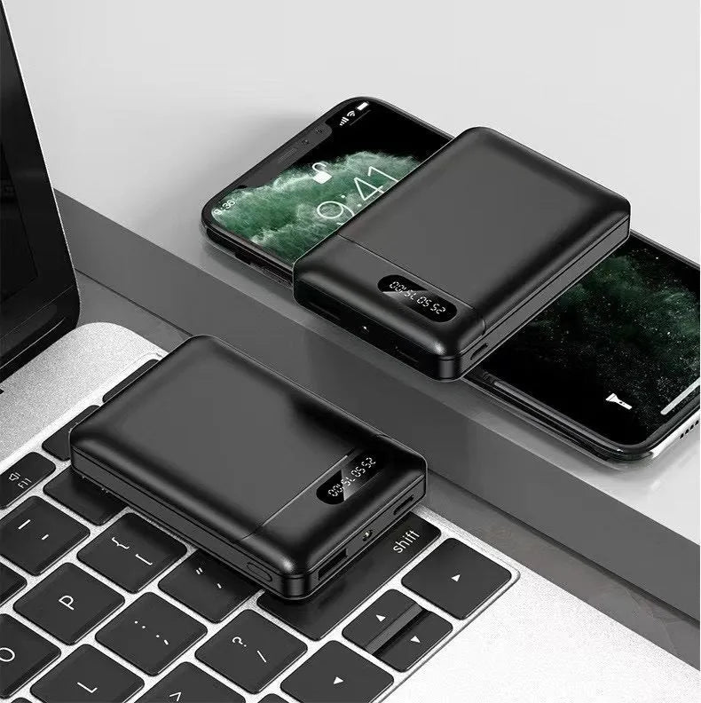 White or black portable power bank with multiple USB ports, showing compact 92mm x 63mm size.