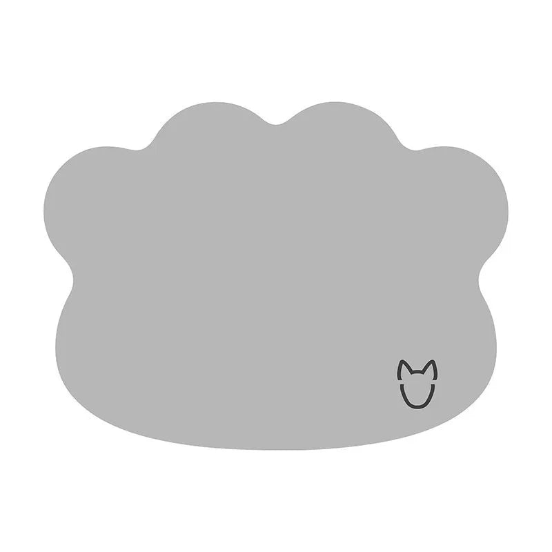 Iced silk pet cooling mat in dark grey with a simple dog head shape, shown on a hardwood floor.