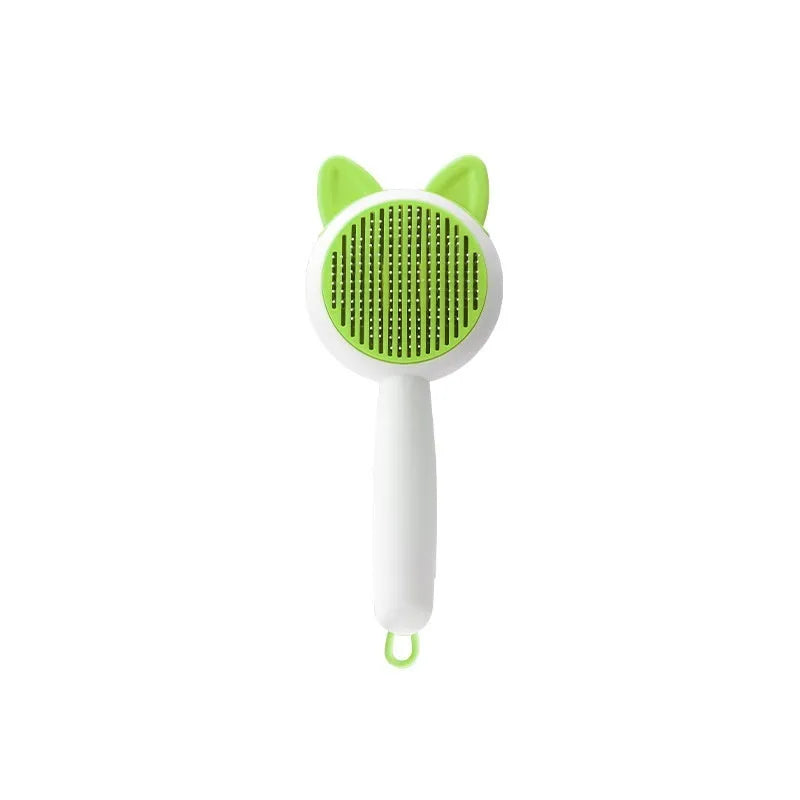 Self-cleaning pet grooming brush with stainless steel bristles and TPR massage tips in greenish white colour