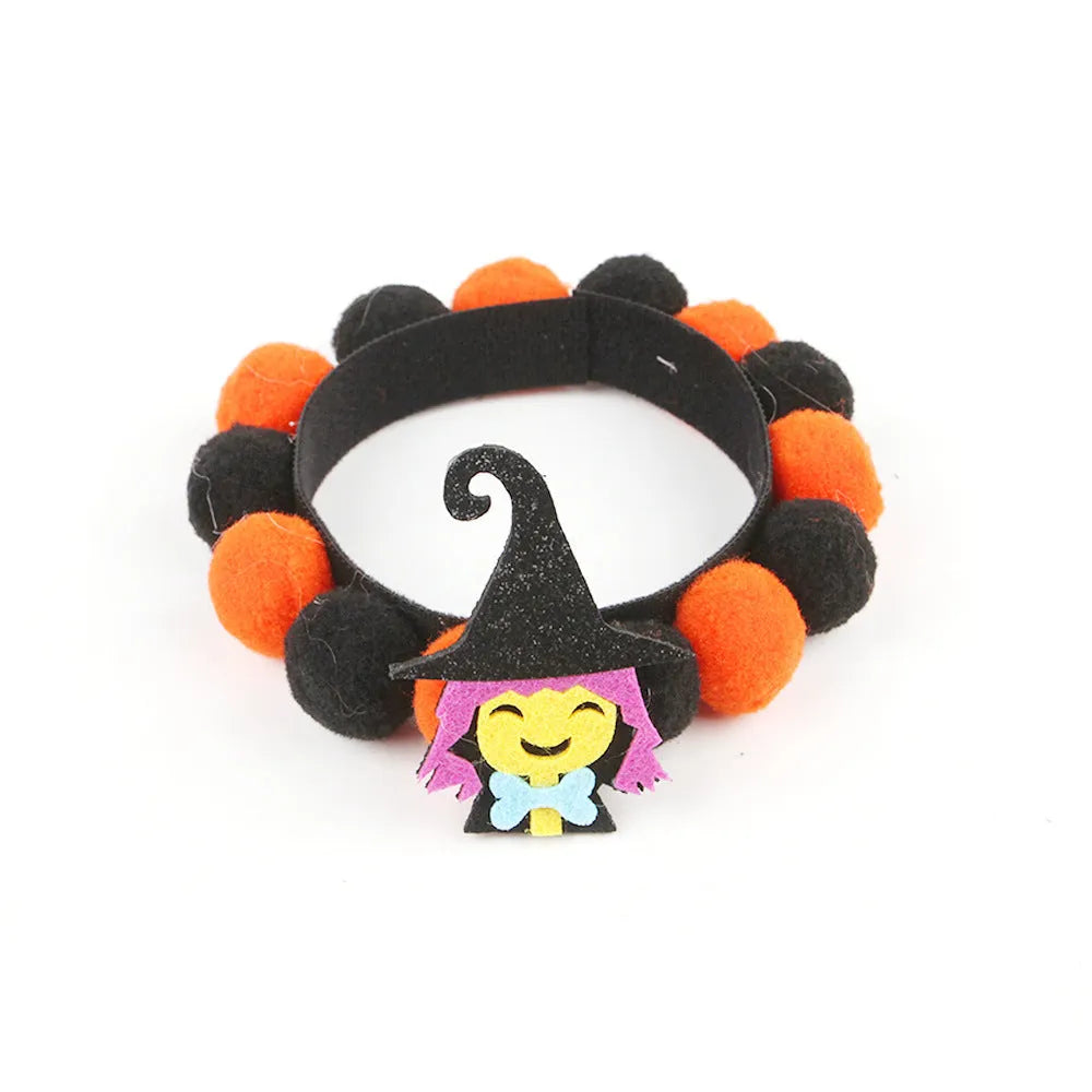 Halloween pet fur ball collar in six designs including pumpkin, skull, and witch themes