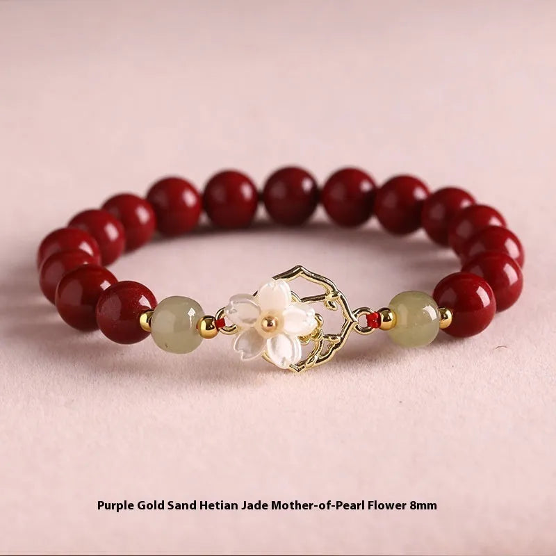 Handcrafted cinnabar women's bracelet with natural Hetian jade accents in New Chinese style design