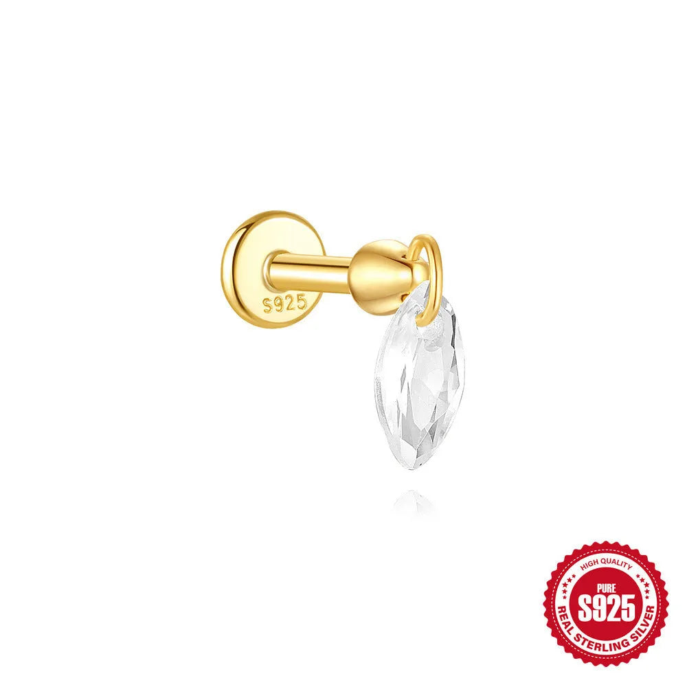 Geometric kite-shaped sterling silver stud earrings with rhinestones and a gold chain tassel.